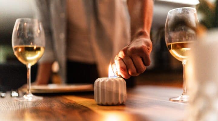 10 Intimate Questions You Always Wanted to Ask a Male Escort for Women 6 Male escort lighting candle