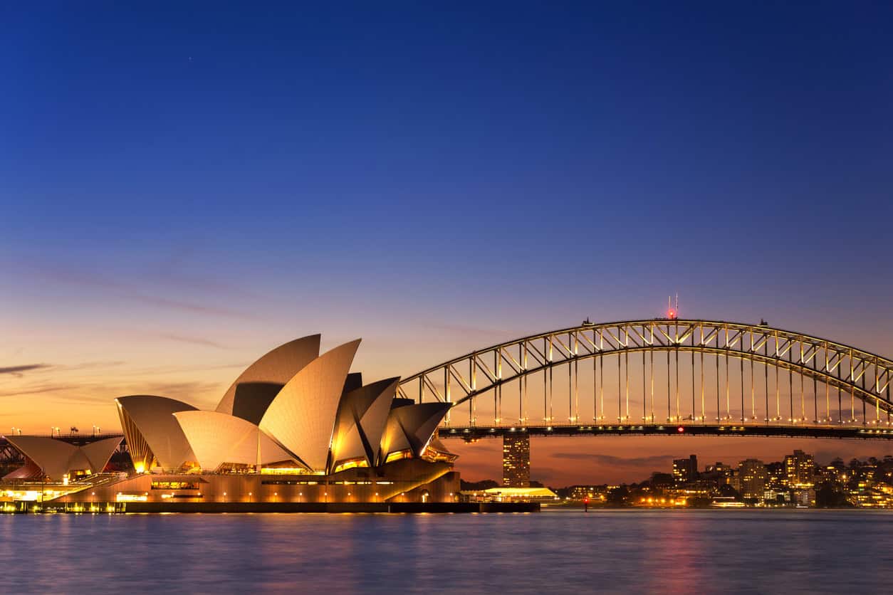 Top 10 Luxury Hotels in Sydney and Melbourne for a Memorable Date with a Male Escort 2 Sydney, Australia - September 5, 2013: Beautiful Opera house view at twilight time with vivid sky and illumination on the bridge.